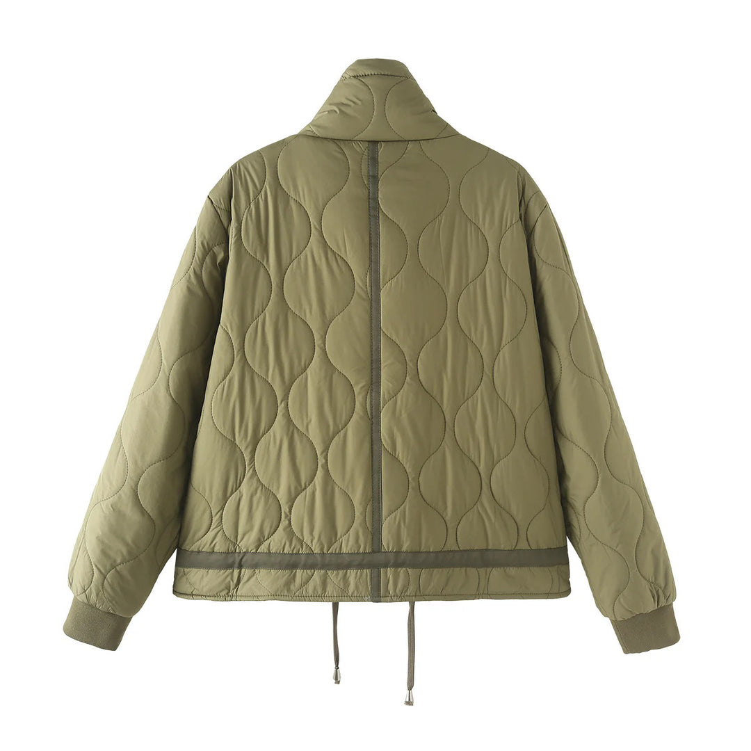 Women’s quilted short jacket with high stand-up collar, large flap pockets, and drawstring hem Mune Fashion