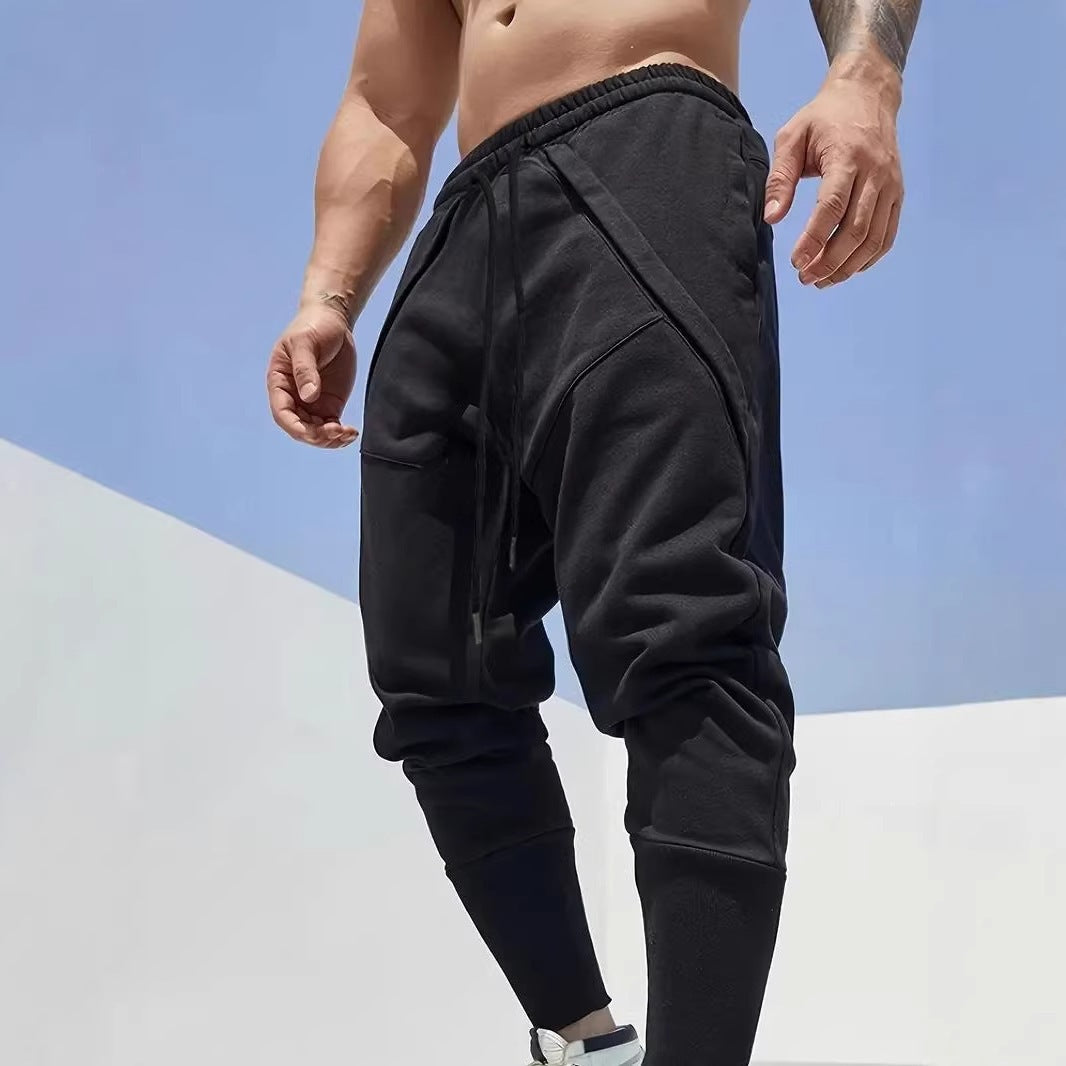 Men's Tapered Jogging Pants with Drop Crotch, Elastic Waistband & Diagonally Placed Pockets Mune Fashion