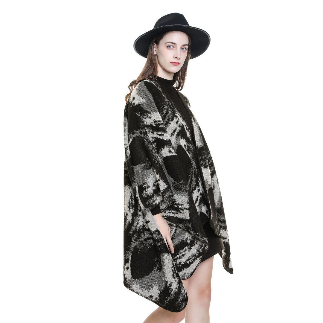 Ladies oversized jacquard cape made of wool blend with graphic watercolor pattern and overlock edge Mune Fashion
