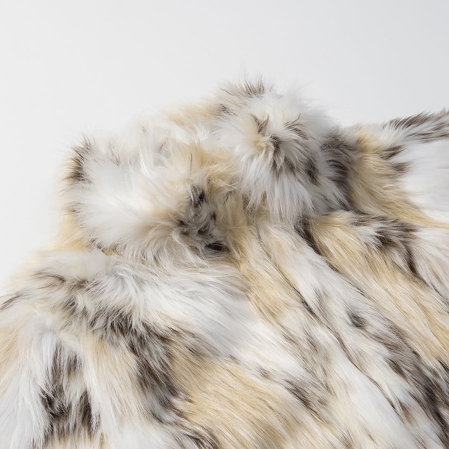 Women's short faux fur jacket in patchwork look with high stand-up collar Mune Fashion
