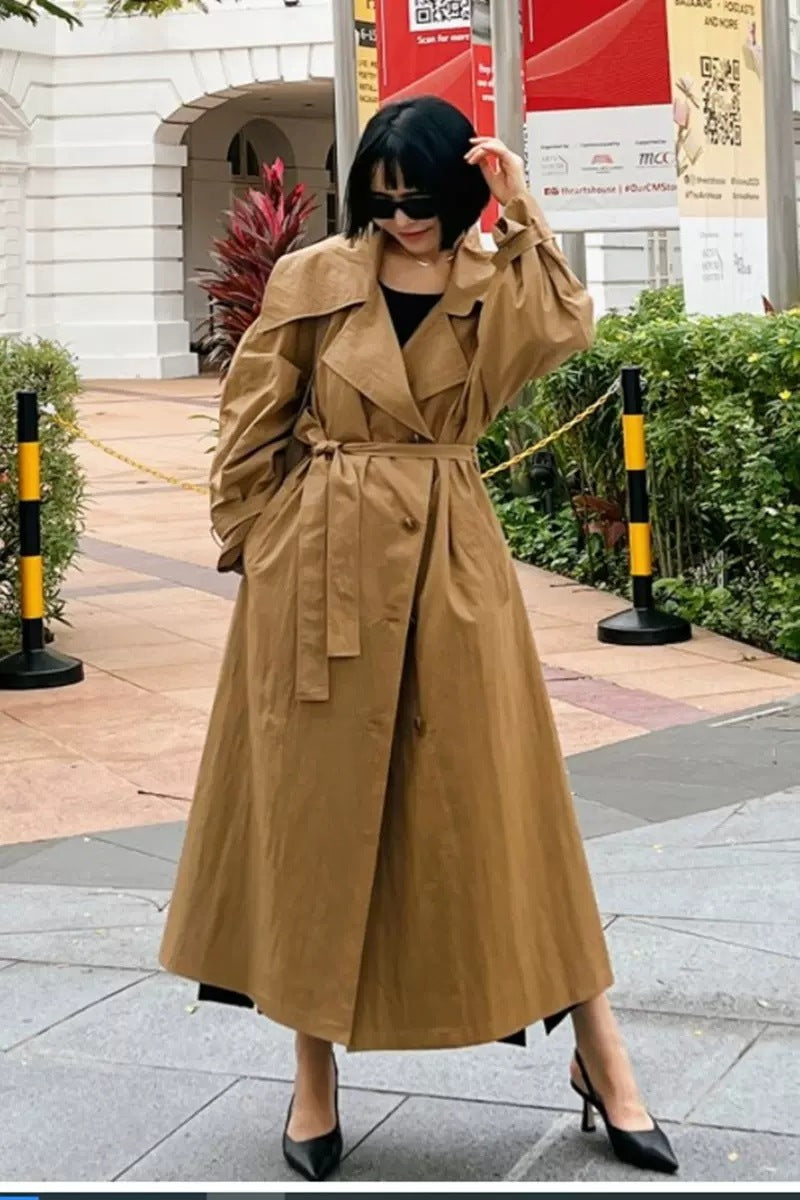 Women's Maxi Length Trench Coat with Oversized Shoulder Yoke, Waist Belt, and Voluminous Sleeves Mune Fashion
