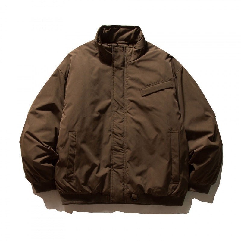 Unisex Boxy-padded transition jacket with high stand-up collar and utility pockets Mune Fashion