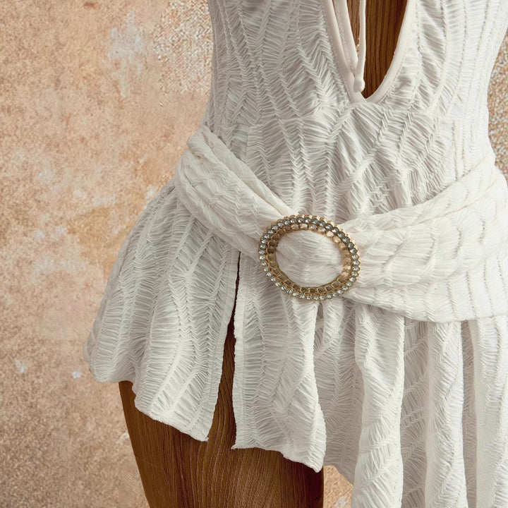 Women's figure-hugging halter mini dress with lacing, cut-out, and asymmetrical wrap skirt Mune Fashion