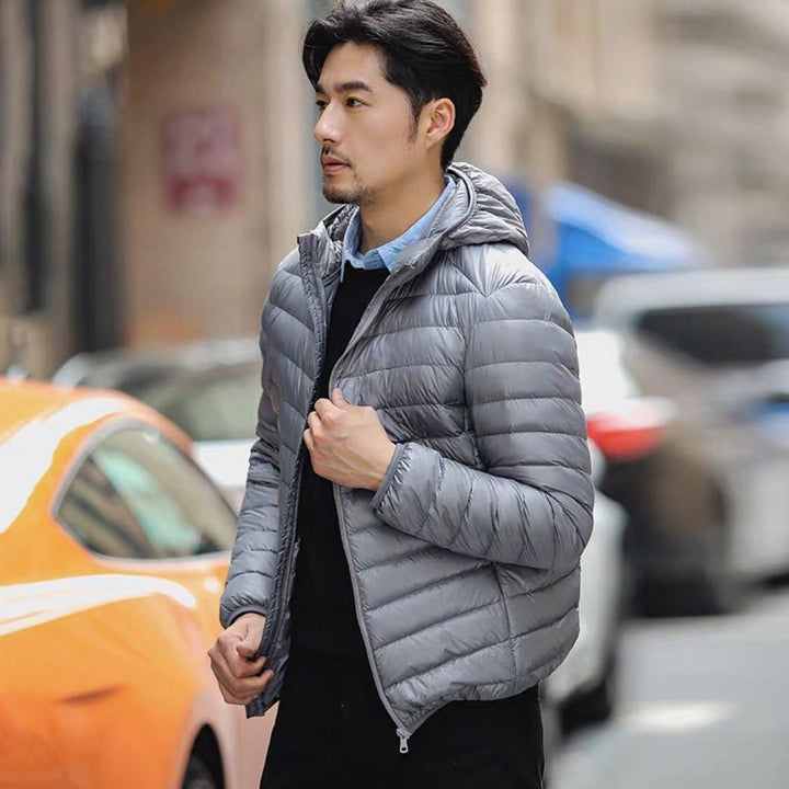 Men's ultralight quilted hooded jacket with wind-resistant shell and compact packing function Mune Fashion