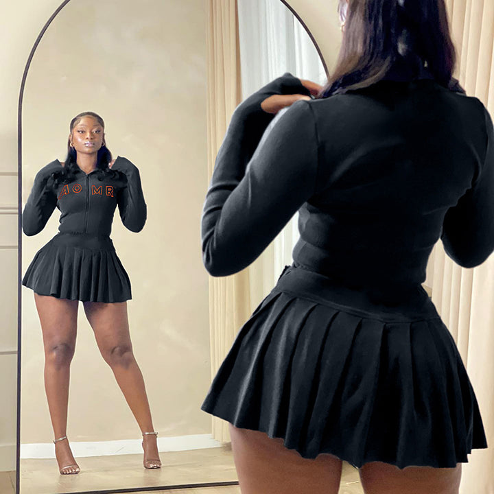 Women nano ribbed two-piece crop set with zipper, stand collar and pleated skirt Mune Fashion