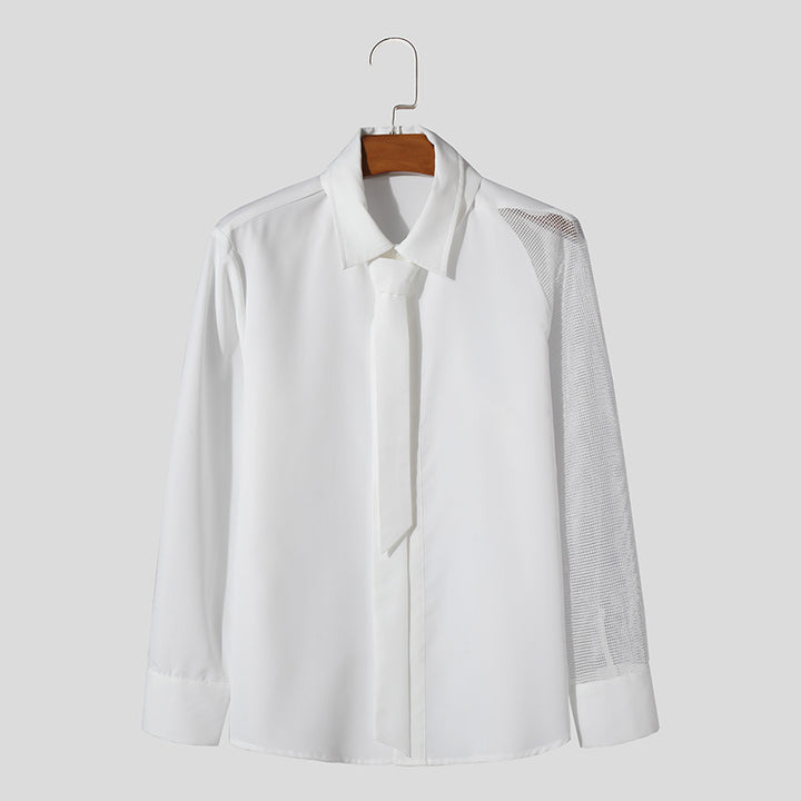 Women’s flowing blouse with attached bow, concealed button placket, and one-sided mesh sleeve detail Mune Fashion