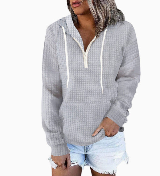 Women's waffle texture hoodie with half zip, kangaroo pocket, and casual oversized cut Mune Fashion