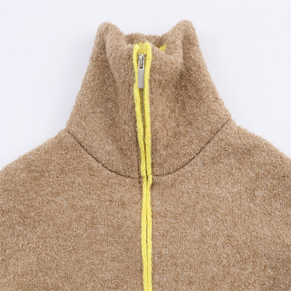 Women's short fleece jacket with high stand-up collar, full zip and patch pockets Mune Fashion