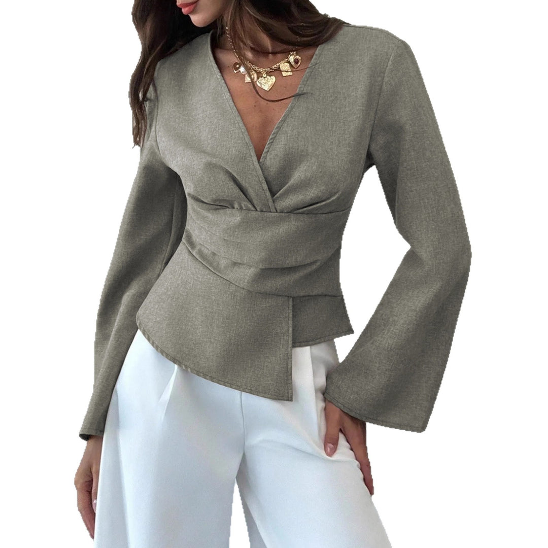 Ladies wrap blouse with tailored draping and flared sleeves Mune Fashion