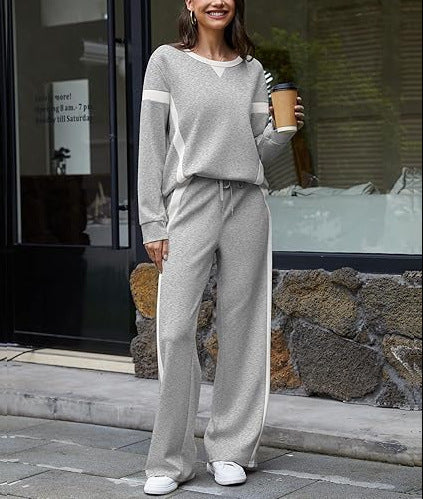 Women nan sports Lounge set with oversized sweatshirt, palazzo pants and side contrast stripes Mune Fashion