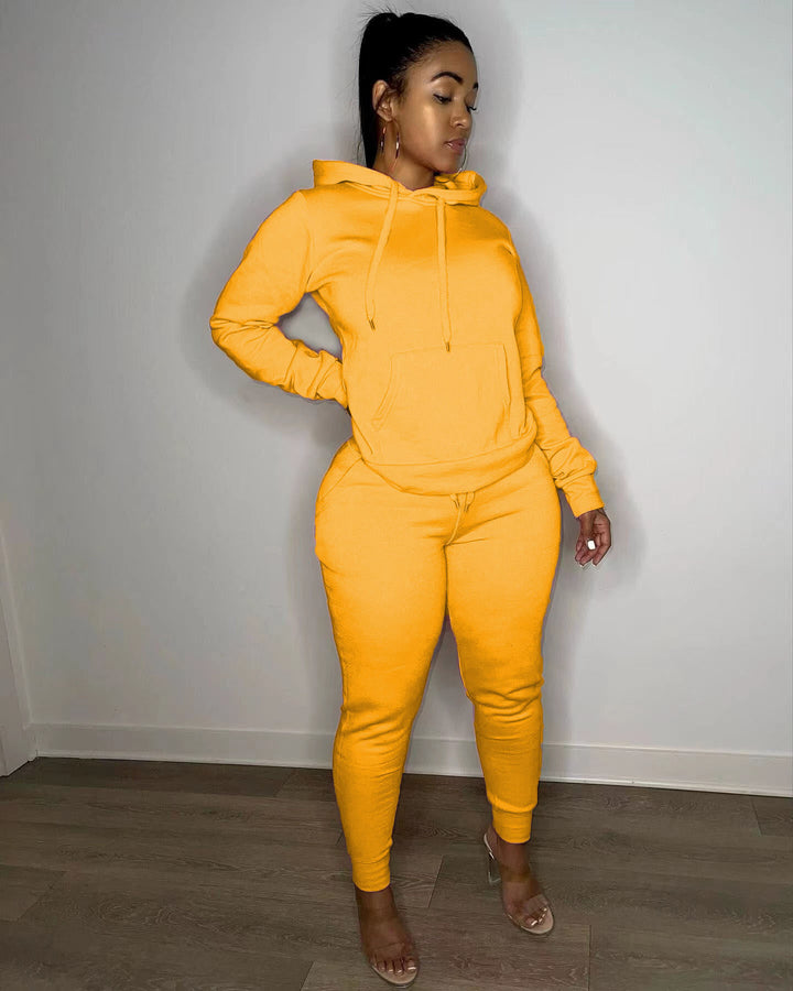 Women's tailored hoodie and jogger set with kangaroo pocket, high comfort waistband, and ribbed ankle cuffs Mune Fashion