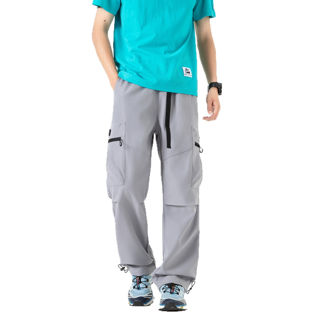 Men's wide technical cargo pants with multi pockets, drawstring and adjustable leg hems Drune