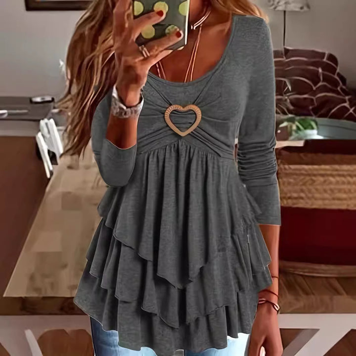Women's layered look tunic with heart-shaped decorative buckle and gathered neckline