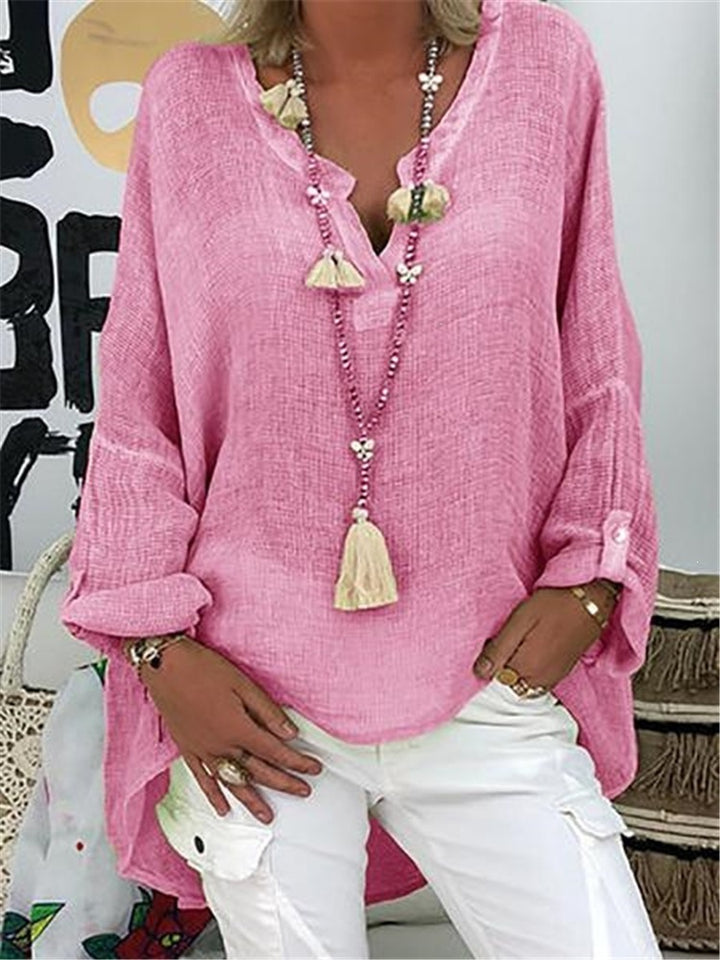 Ladies' nano structured cotton tunic in a loose fit with V-neck, rolled sleeves, and extended back hem Mune Fashion