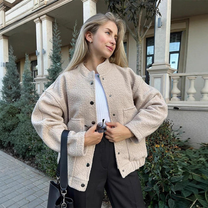 Women's teddy fleece bomber jacket in boxy cut with snap button closure and patch pockets Mune Fashion