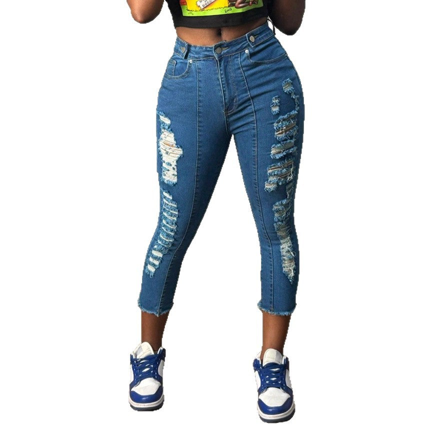 Women's high-cut ankle-length skinny jeans with generous rip details and raw hem Mune Fashion