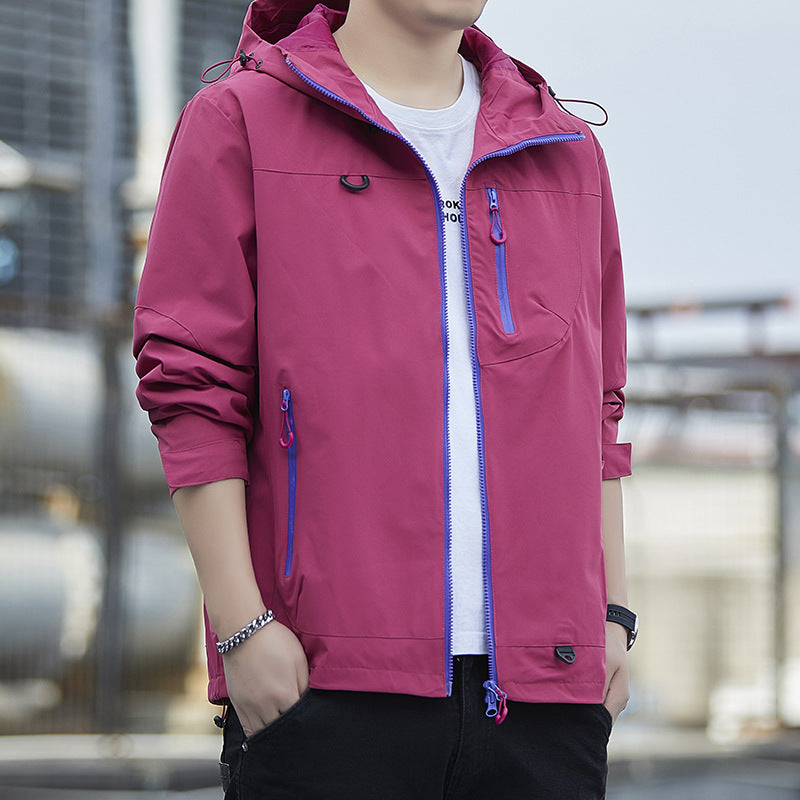 Men's lightweight Urban softshell hoodie jacket with contrasting zippers, chest pocket, and adjustable drawstring hem Mune Fashion