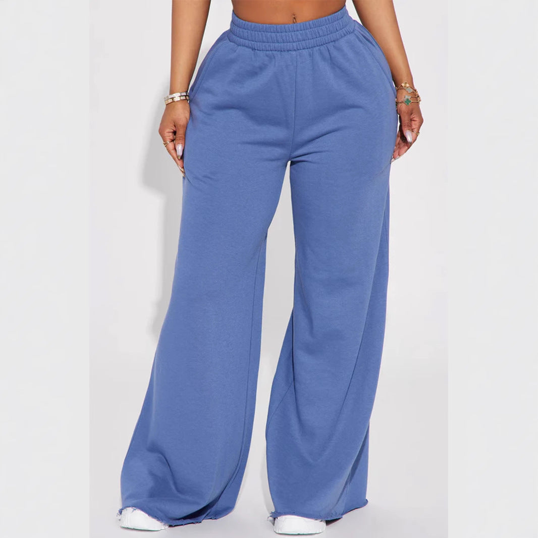 Ladies high-waist palazzo trousers made of French terry with wide legs, elastic comfort waistband and open hem edges Mune Fashion