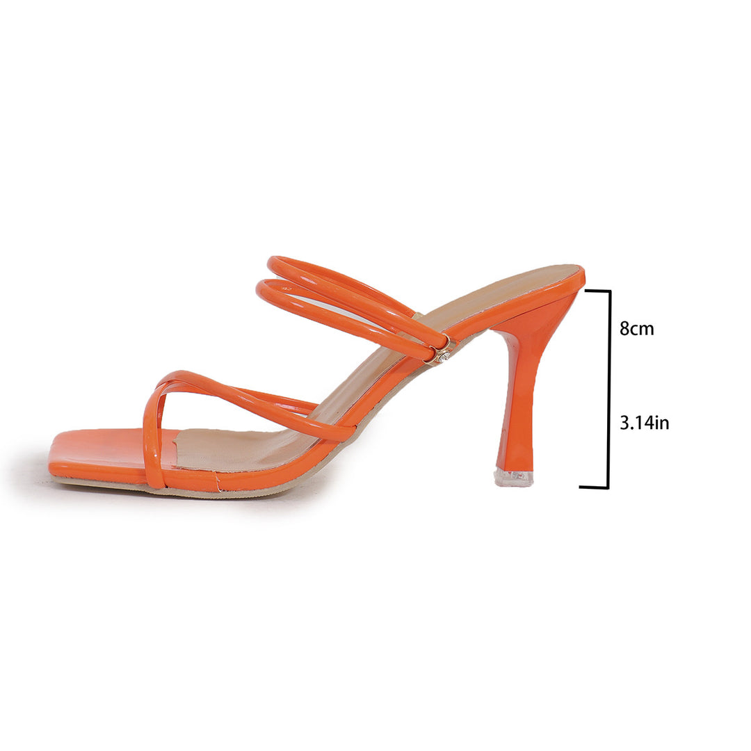 Ladies' elegant slip-on mule with narrow patent straps, square toe area, and high stiletto heel Mune Fashion