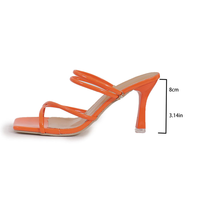 Ladies' elegant slip-on mule with narrow patent straps, square toe area, and high stiletto heel Mune Fashion