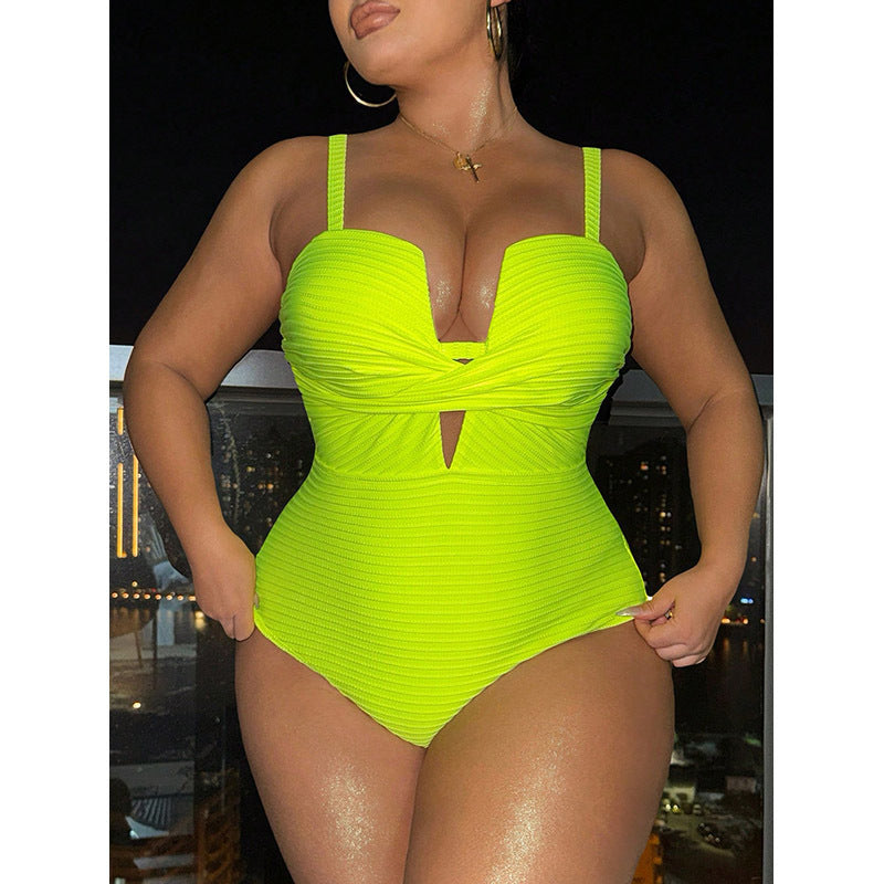 Women's one-piece swimsuit with sophisticated wrap design and deep V-neck Mune Fashion