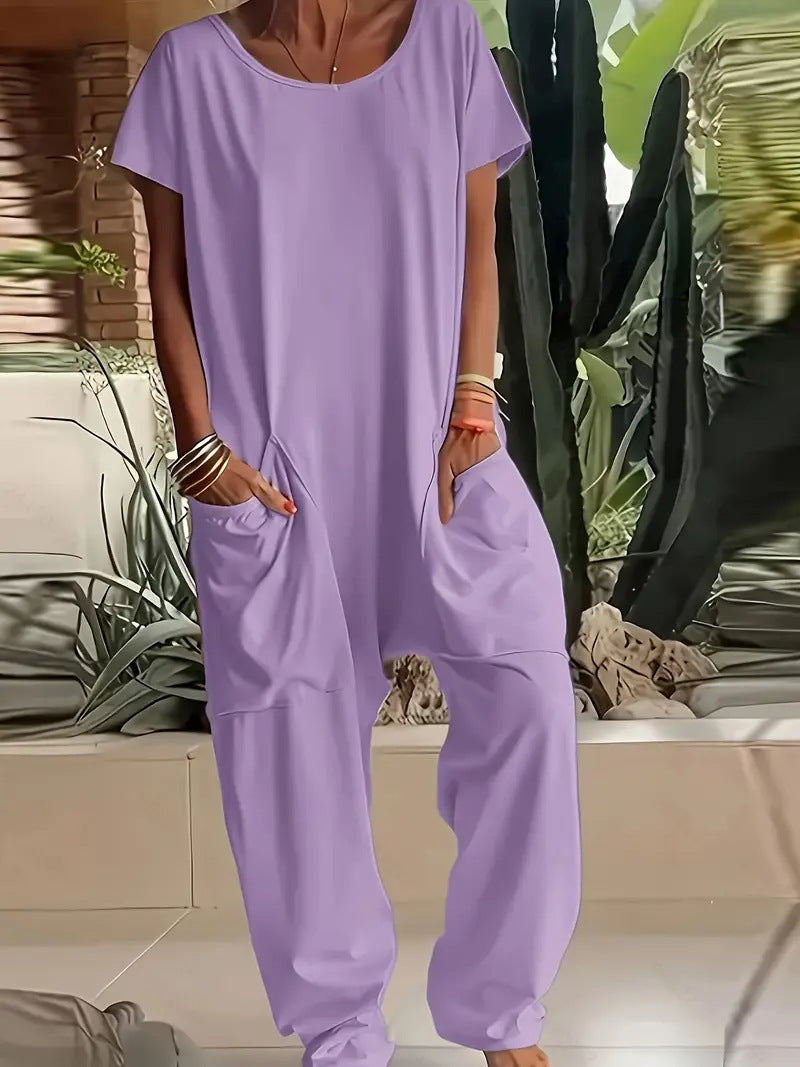 Women's comfortable oversized jumpsuit with V-neck, deep crotch and inset pockets Mune Fashion