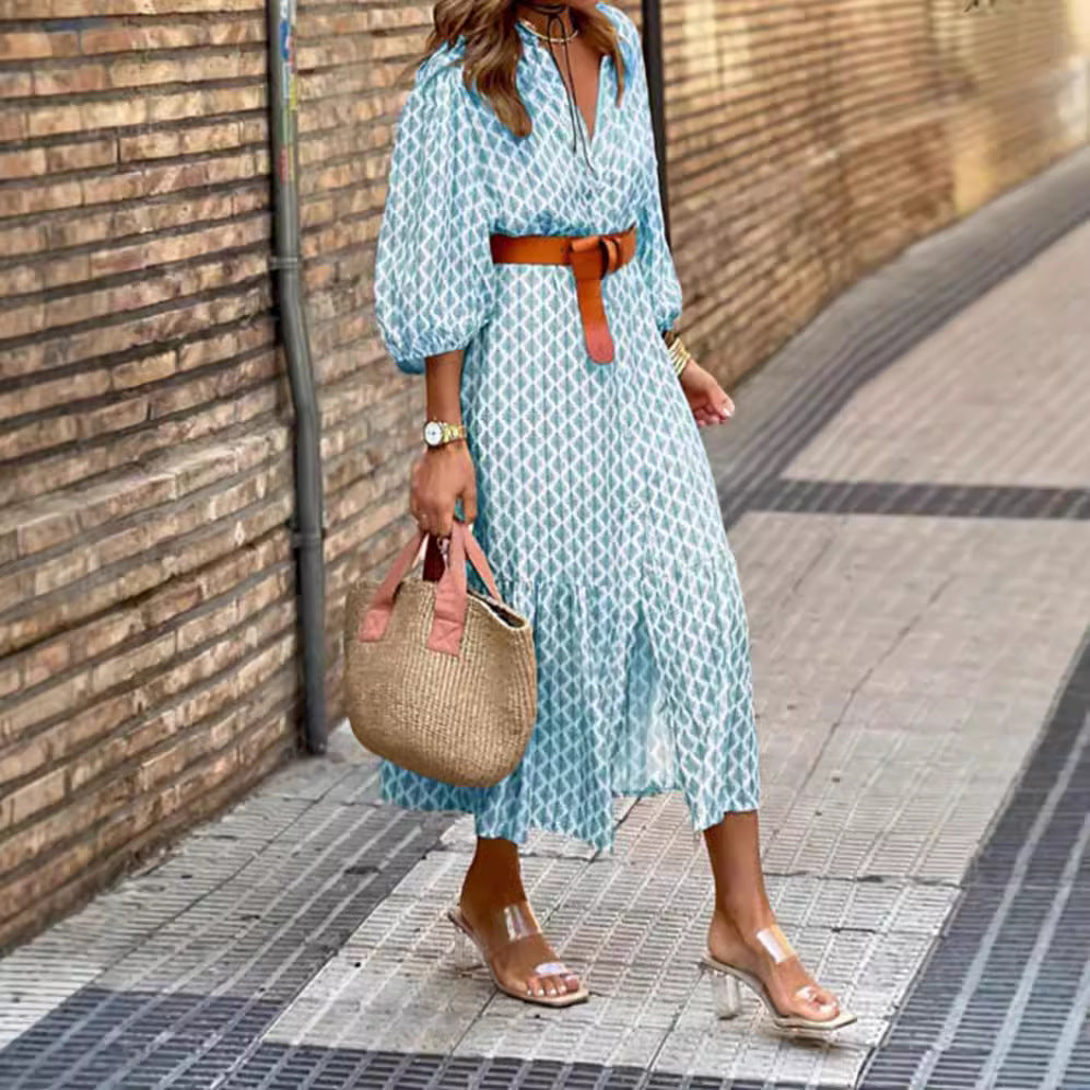 Women's lightweight patterned midi dress with V-neck, button placket, tiered skirt, and balloon sleeves Mune Fashion