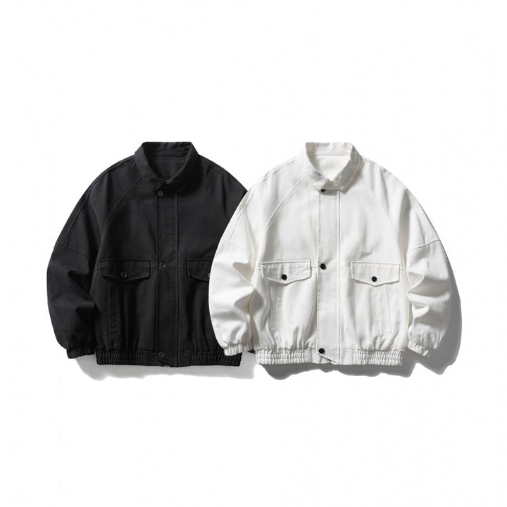 Unisex short-cut boxy jacket made of denim with elastic hem and flap pockets Mune Fashion