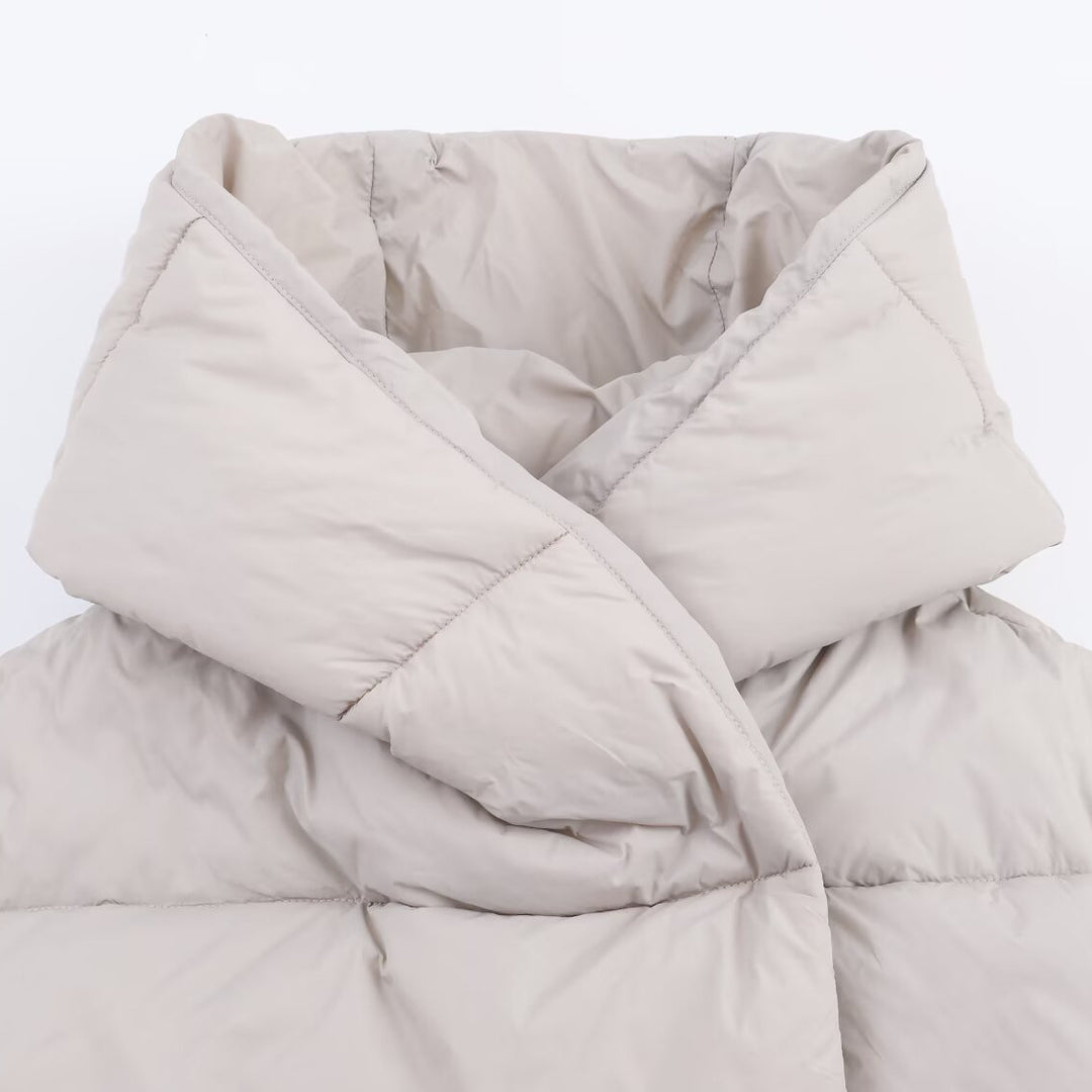 Women short cut oversized quilted jacket with high wrap collar and padded lining Mune Fashion