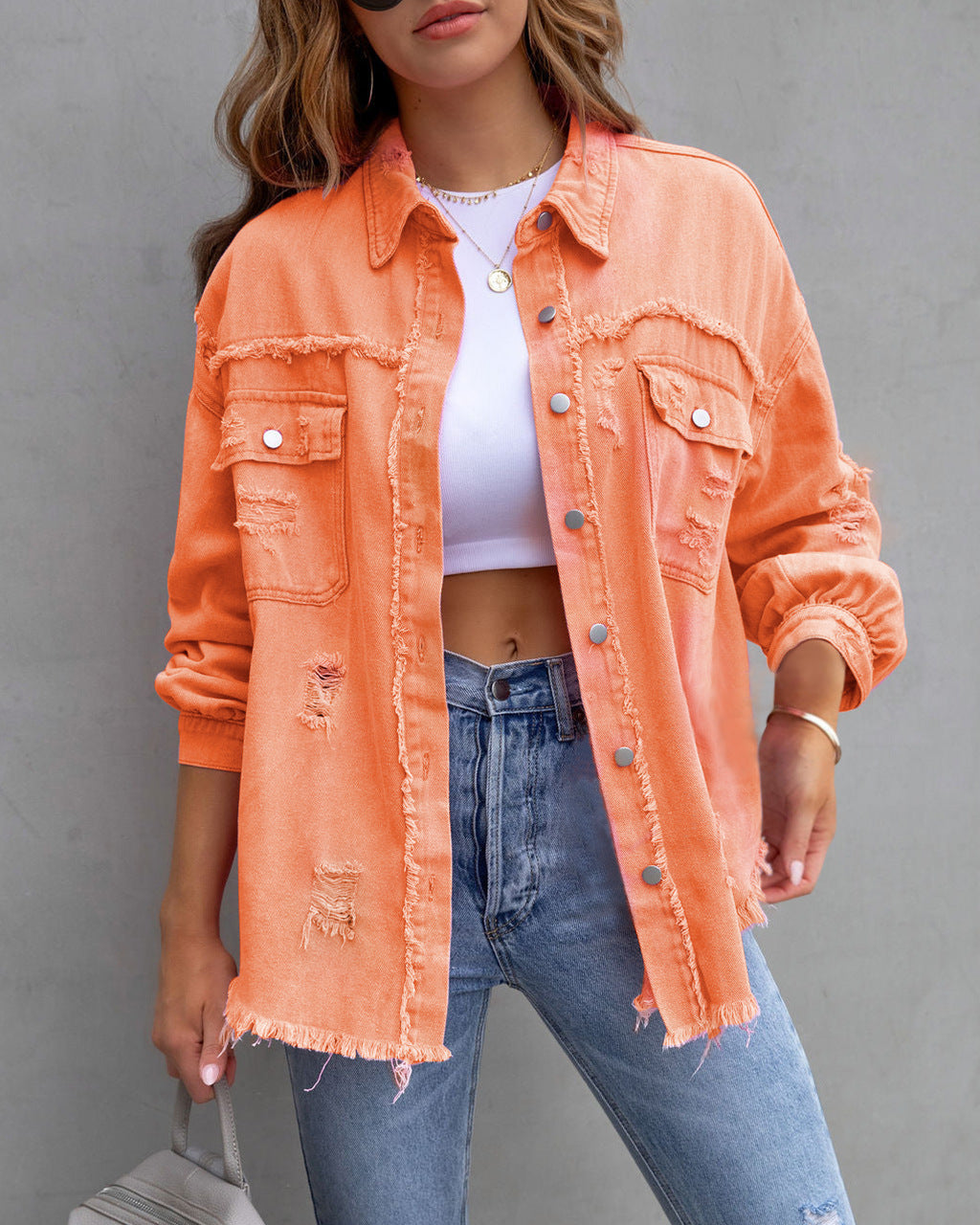 Women's oversized utility denim shirt jacket with fringe trim and patch pockets Mune Fashion