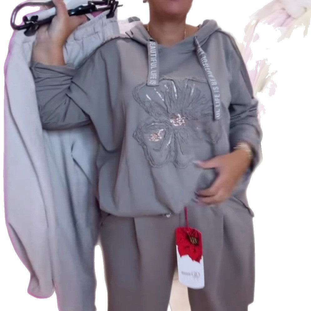 Women's relaxed lounge set with floral sequin hoodie, drawstring and wide pleated pants Mune Fashion