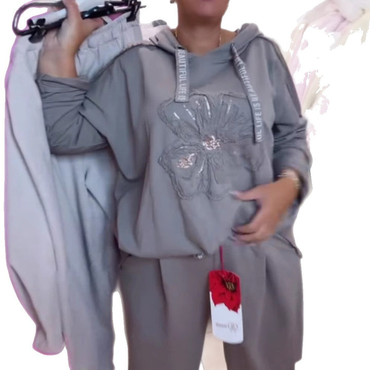 Women's relaxed lounge set with floral sequin hoodie, drawstring and wide pleated pants Mune Fashion