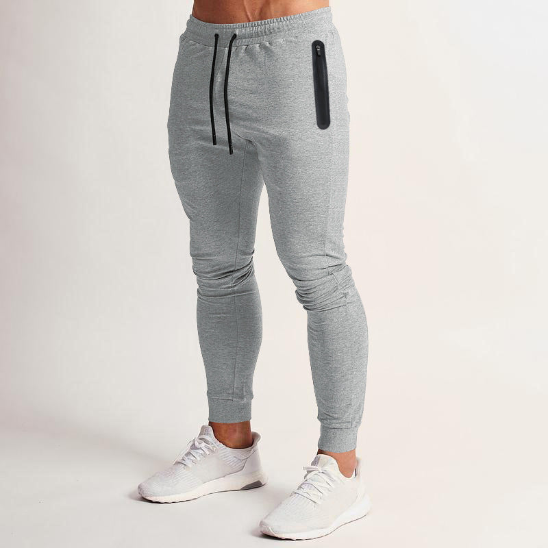 Men's slim-fit jogging pants with zip pockets and drawstring Mune Fashion