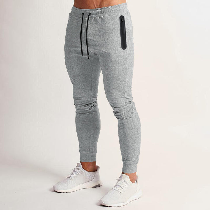 Men's slim-fit jogging pants with zip pockets and drawstring Mune Fashion
