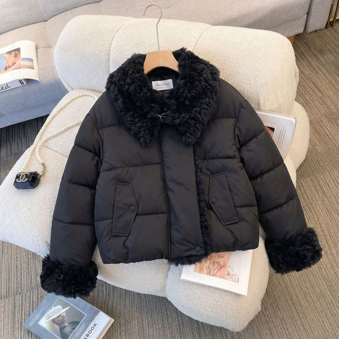 Women's fitted quilted jacket with voluminous teddy collar and detachable pom-pom details Mune Fashion