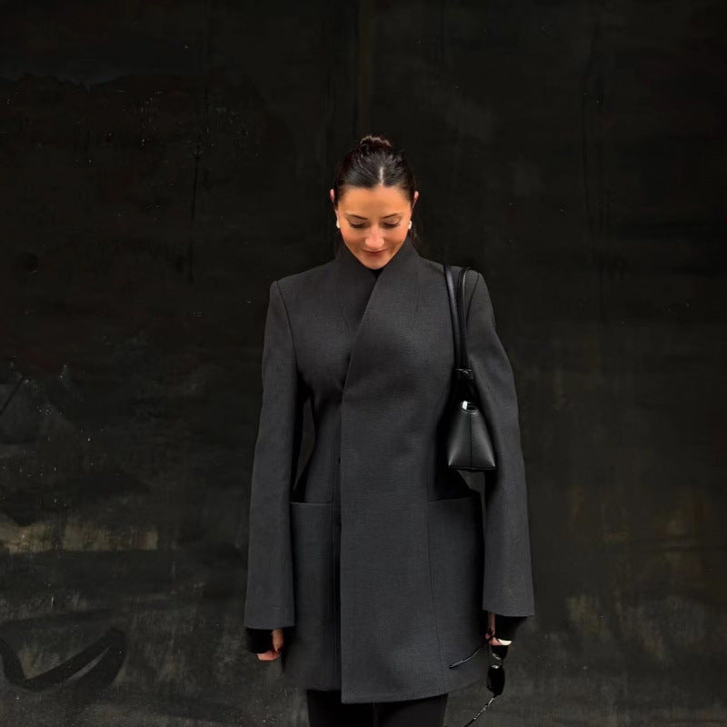Women's tailored blazer dress coat with stand collar, distinctive shoulder shape, and patch pockets Mune Fashion