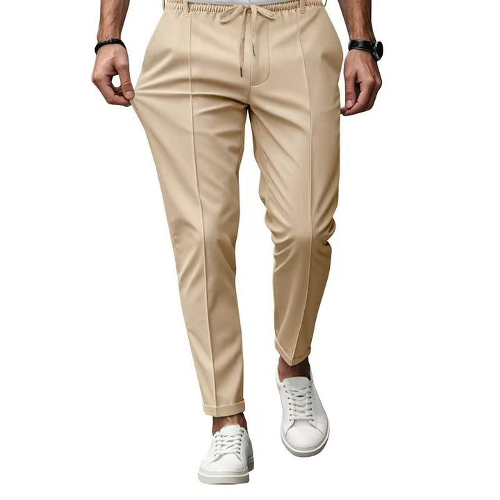 Men's elegant straight-cut chino jogging pants with crease, elastic waistband and drawstring Mune Fashion