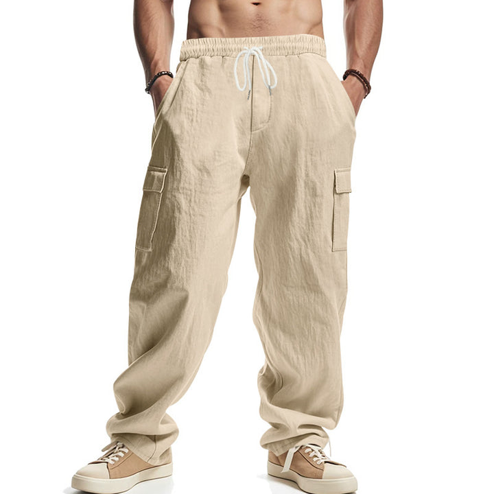 Men's wide cargo pants with flap pockets, elastic comfort waistband, and turned-up hem Mune Fashion
