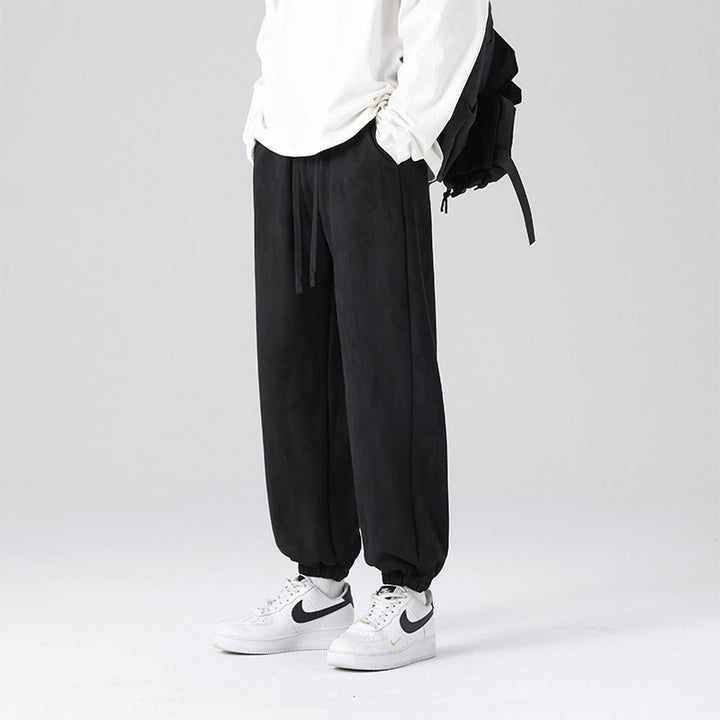 Men's joggers in a relaxed fit with a crease, drawstring, and elastic cuffs Mune Fashion