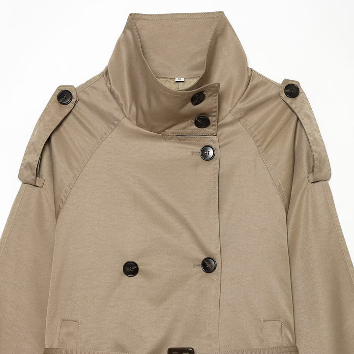 Ladies short tailored trench coat in cape look with high funnel collar and buckle cuffs Mune Fashion
