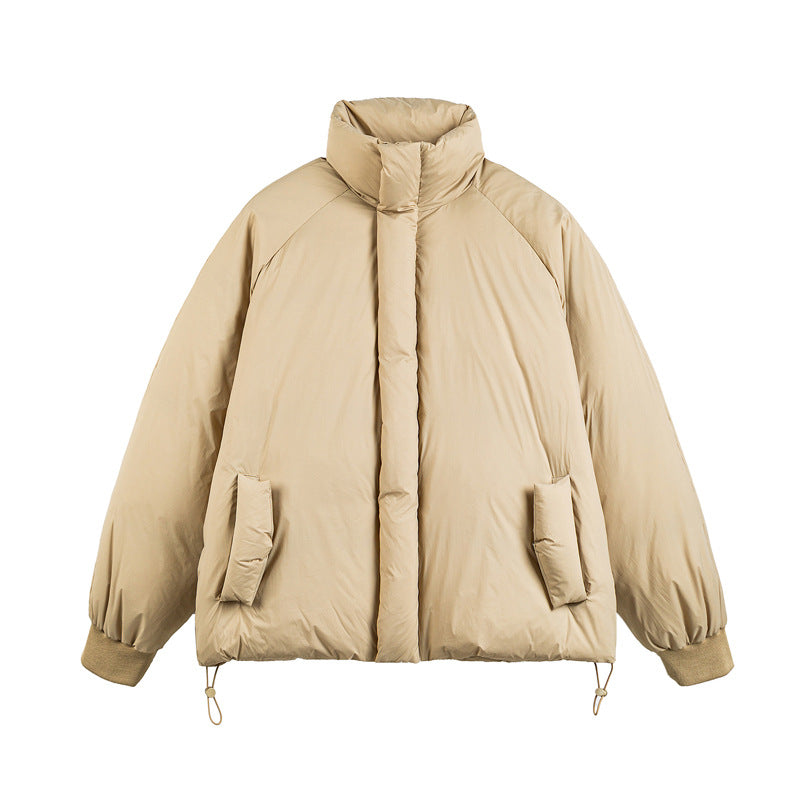 Unisex Boxy-padded short jacket with high stand-up collar, raglan sleeves and drawstring hem Mune Fashion