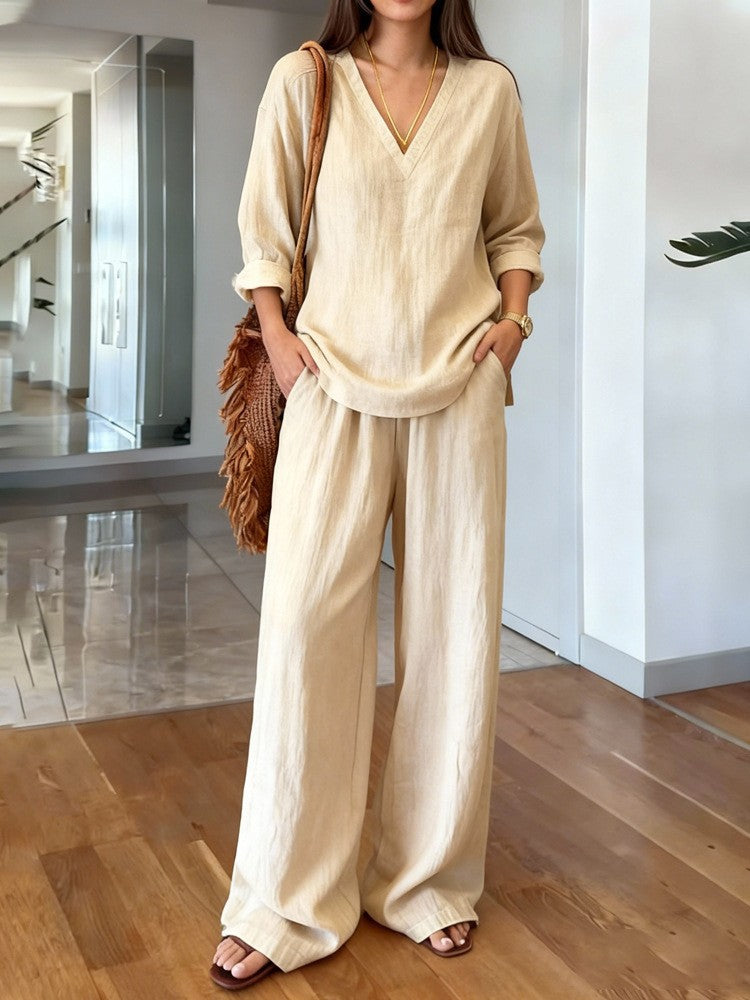 Women's lightweight linen look two-piece set with deep V-neck, loose 3/4 sleeves, and wide palazzo pants cut Mune Fashion