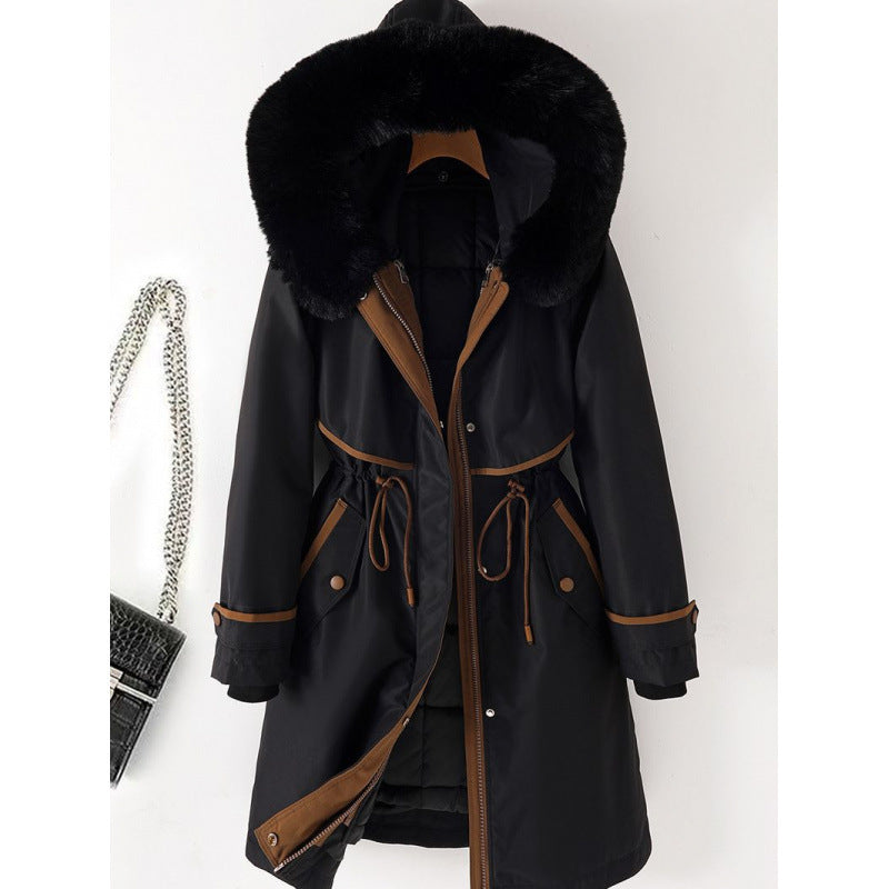 Women's long parka with faux fur hood, waist drawstring, and contrasting piping Mune Fashion