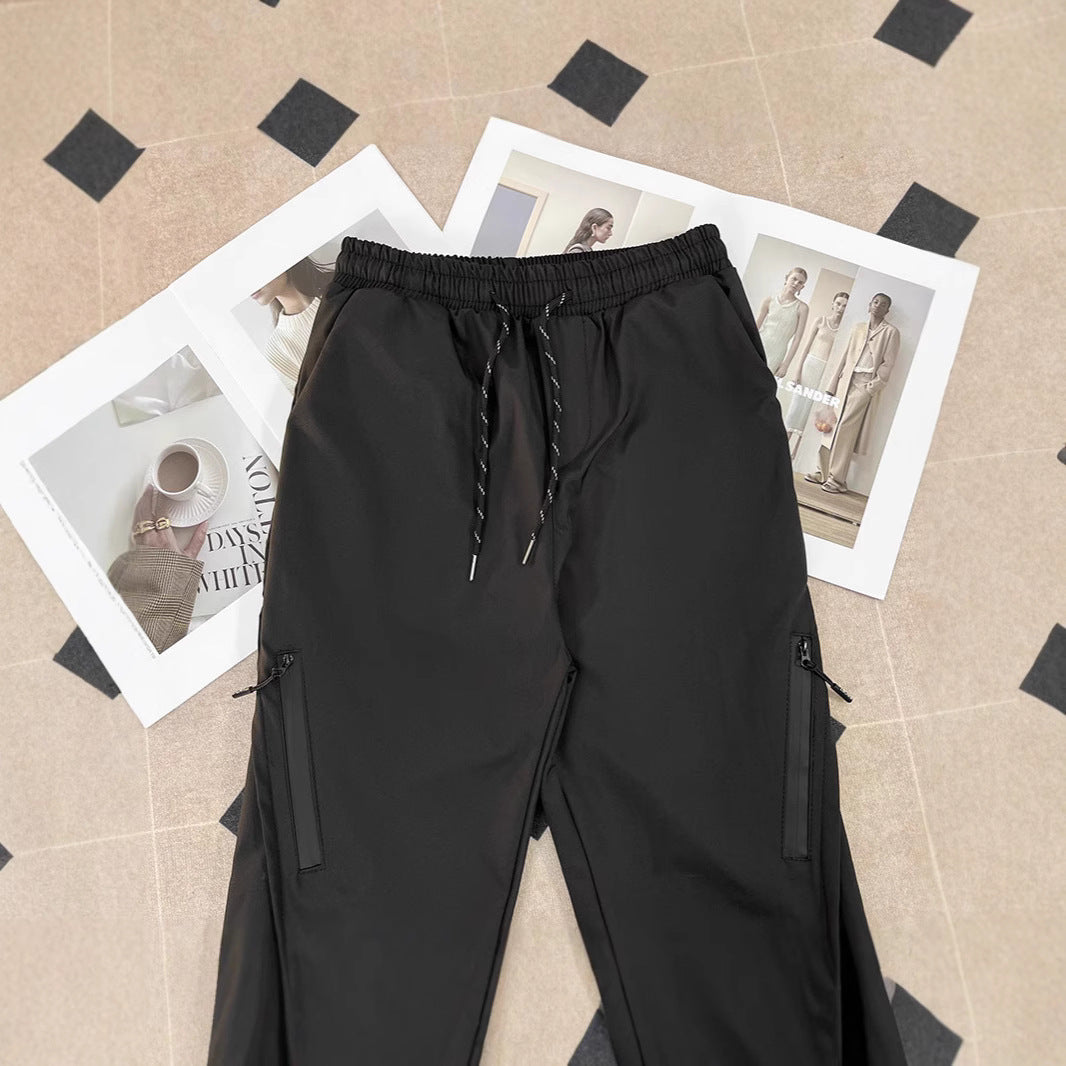 Unisex sporty jogging pants with adjustable waistband and side pockets Mune Fashion