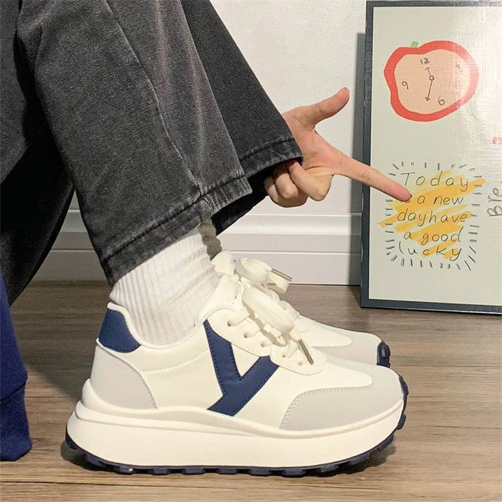 Women's platform sneaker with contrasting V design, thick tread sole and padded comfort collar Mune Fashion