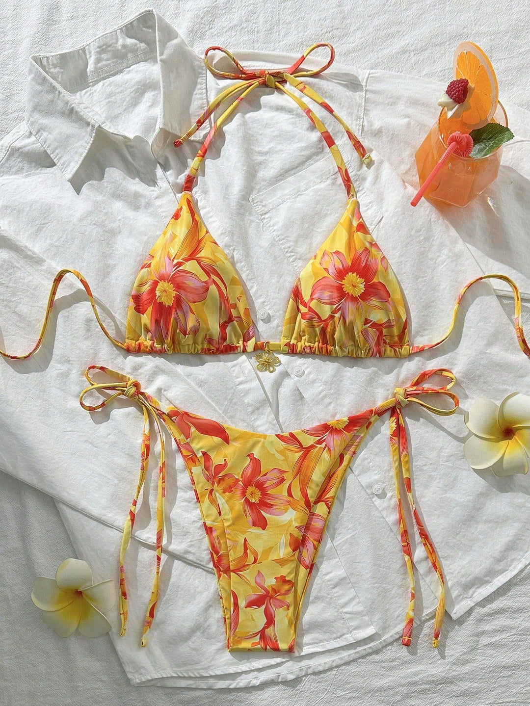 Women's triangle bikini with floral accents and intricate ties Mune Fashion