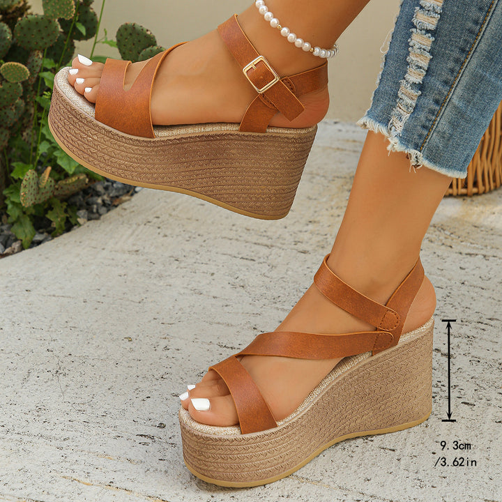 Women's wedge slide with braided jute wedge, crossed straps, adjustable buckle tab, and padded footbed Mune Fashion