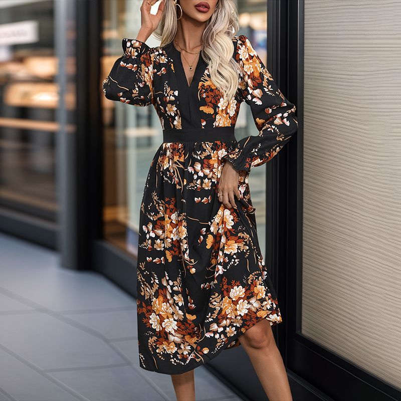 Women’s midi dress with fitted waist, V-neck, long sleeves, and floral all-over print Mune Fashion