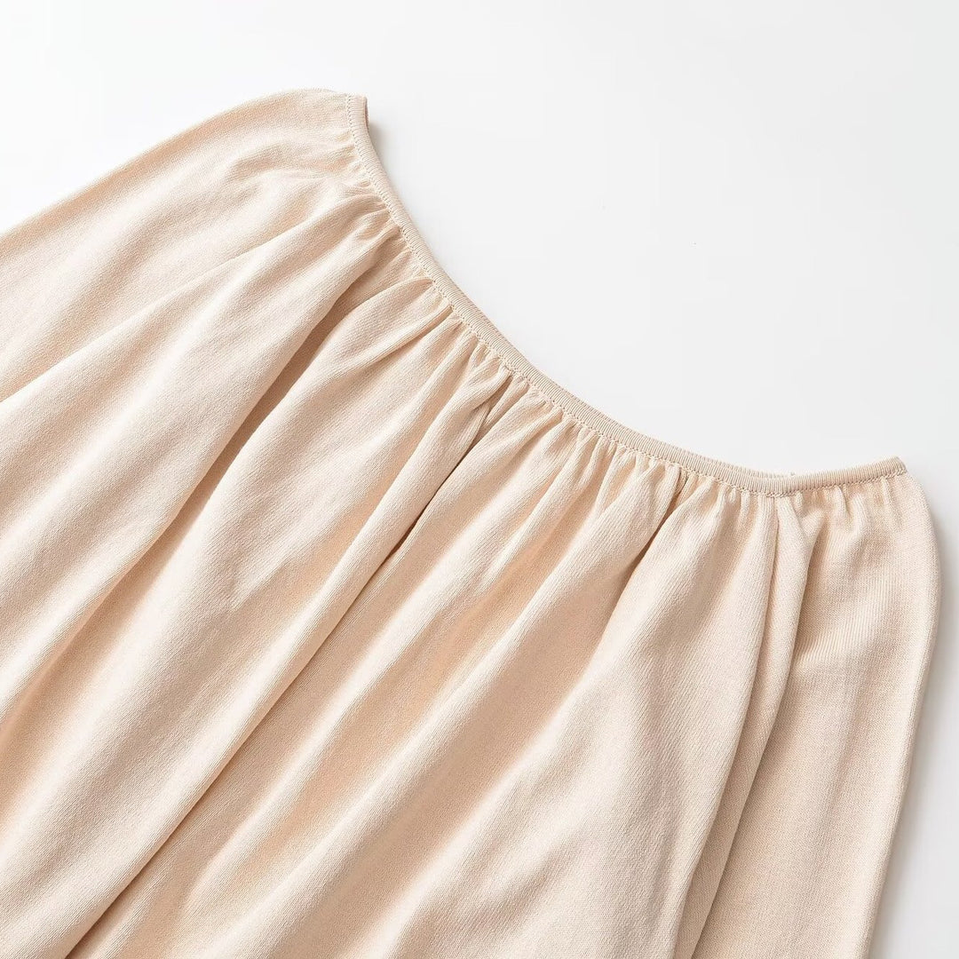 Women's Off-Shoulder Oversized Top with Ruffled Neckline, Balloon Sleeves, and Wide Ribbed Cuffs Mune Fashion
