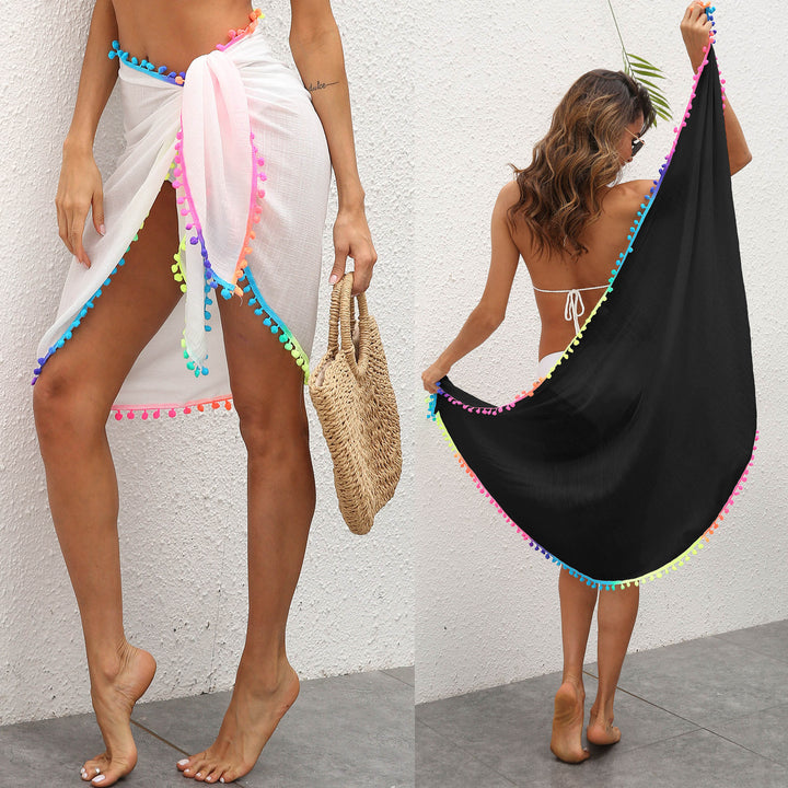 Ladies elegant beach cover-up with colorful pom-pom trim Mune Fashion